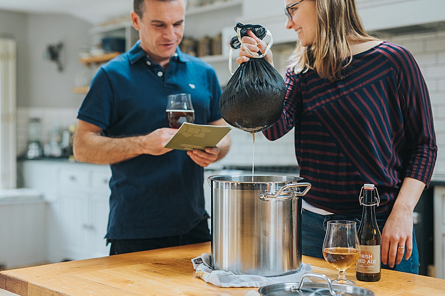 Photo of friends brewing beer at home by Emma Collins
