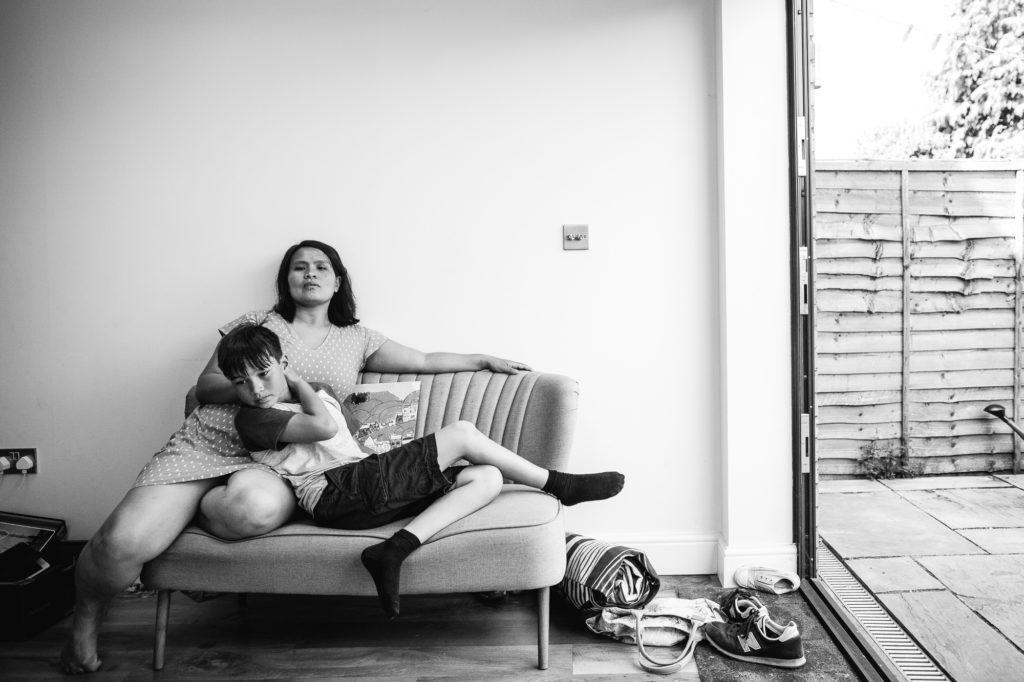 Environmental portrait of mother and son by Emma Collins