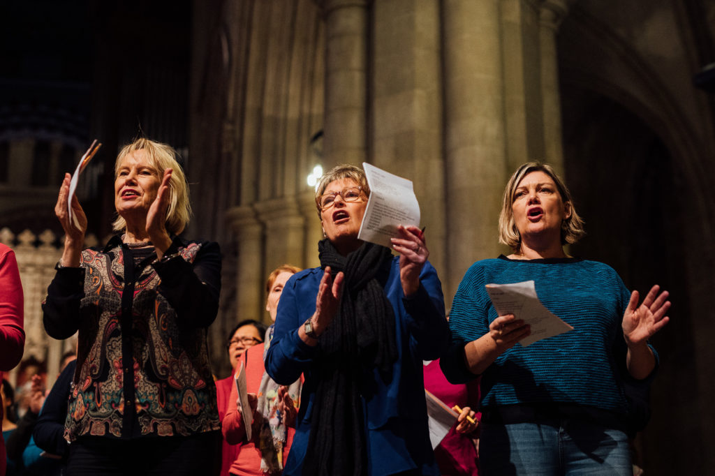Women performing in choir St Albans Cathedral big sing