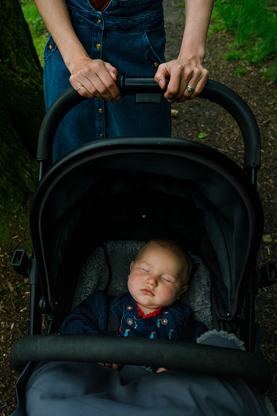 Sleeping baby in pram real life baby photographer Harpenden