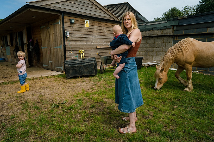Environmental documentary portrait of a mother by Emma Collins London family photographer