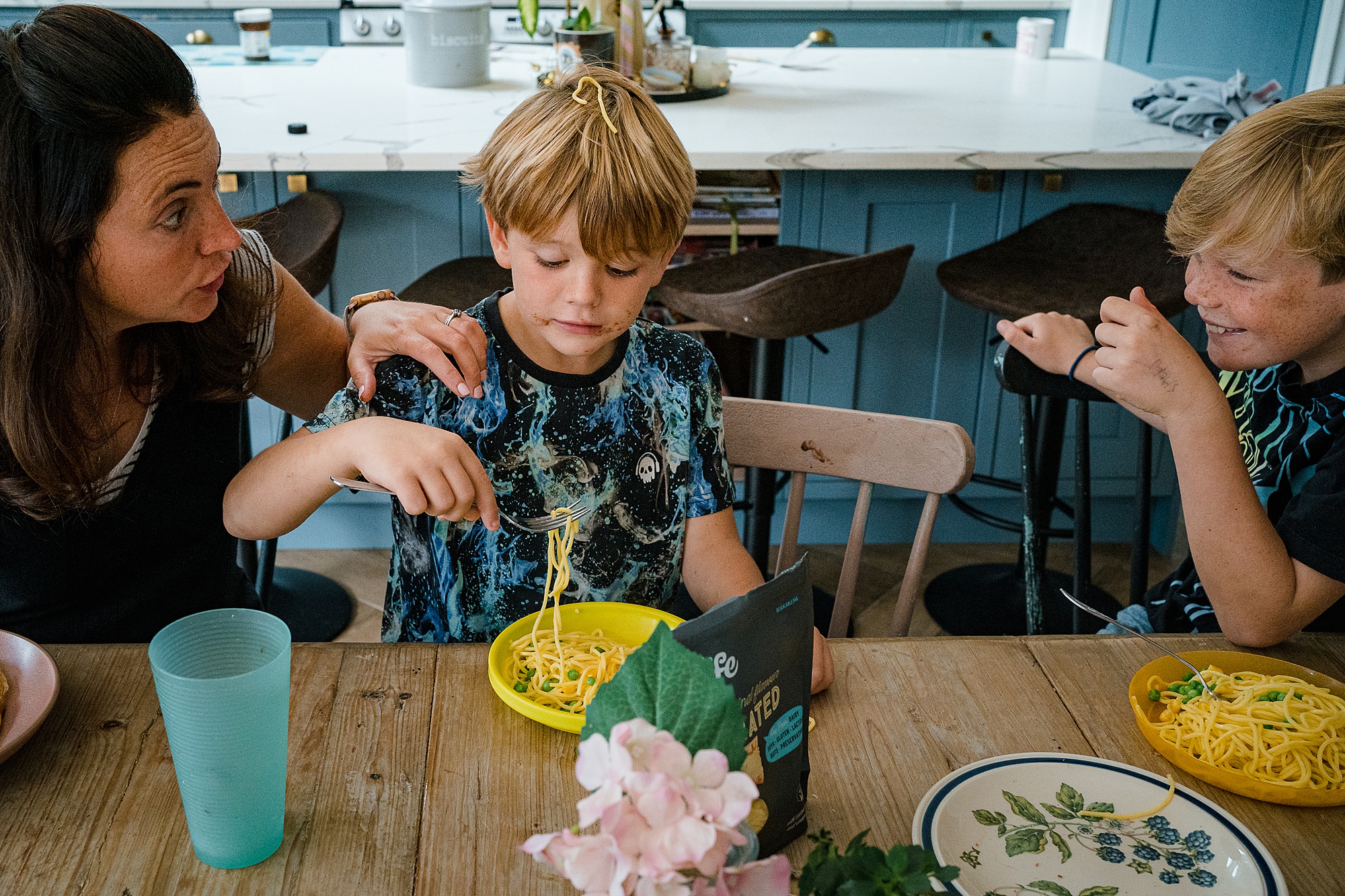 Arguments at dinner time captured by documentary family photographer Emma Collins